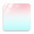 Pastel gradient tempered glass digital bathroom scale on a white background