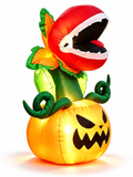 Lighted carnivorous plant and pumpkin Halloween inflatable on a seamless white background