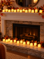 Warm white flameless LED candles decorating an autumn fireplace