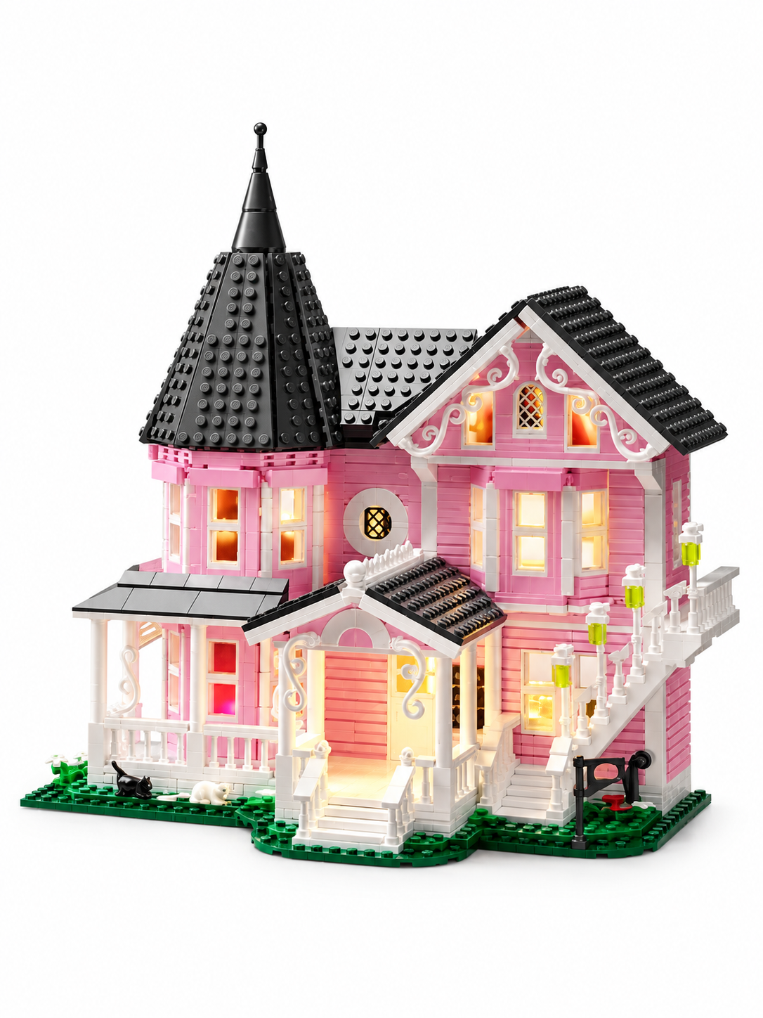 Pink Victorian LED building block house on a white background