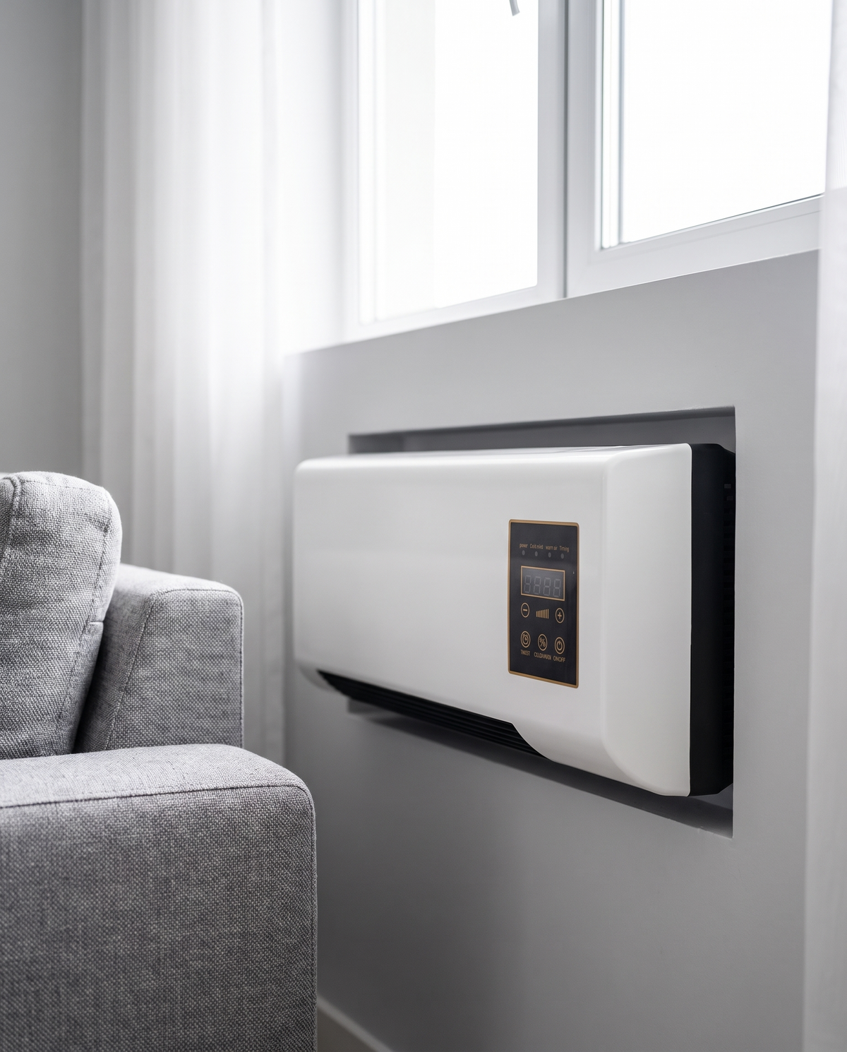 Through-wall AC/heater installed in a living room, midday