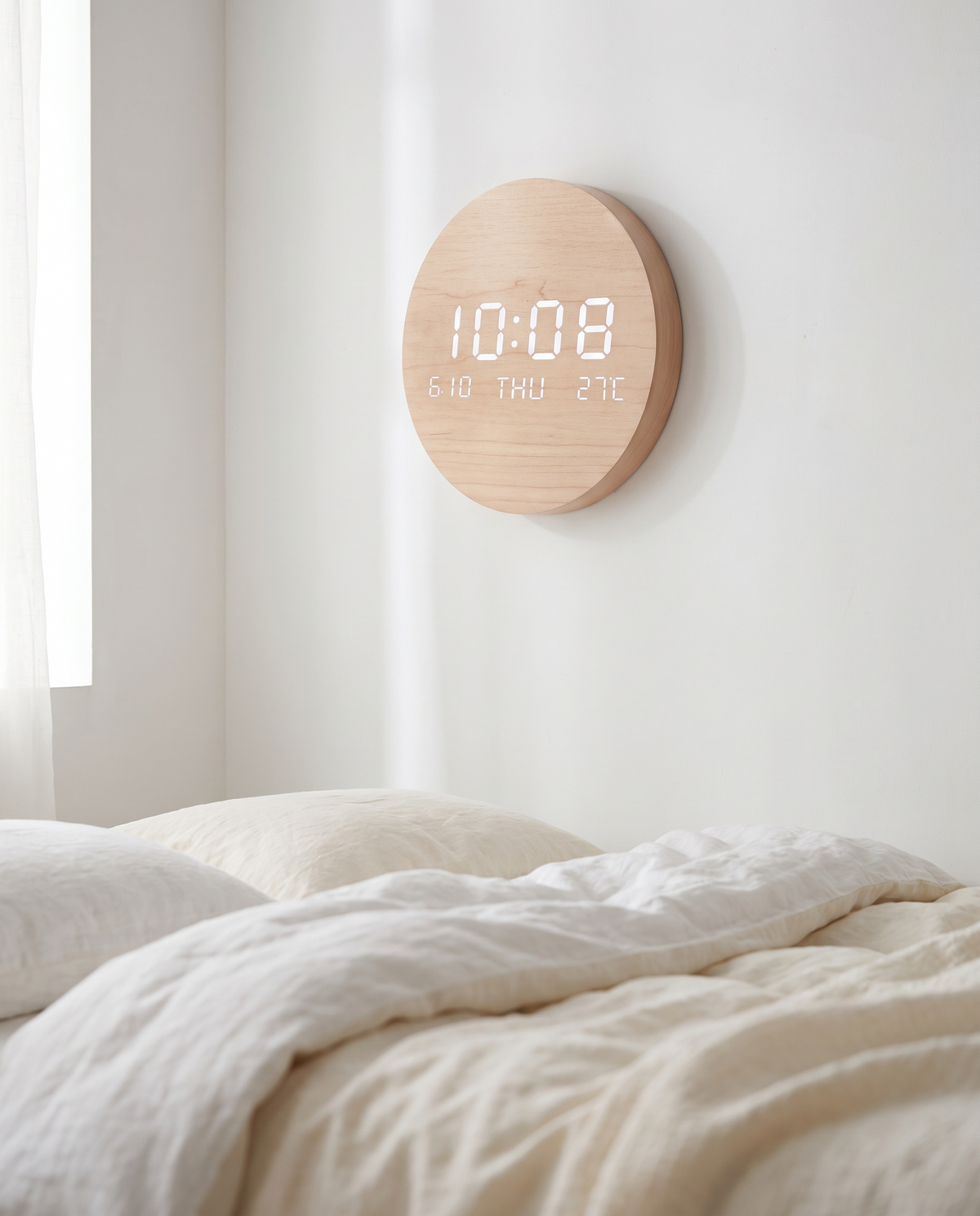 Cordless Rechargeable Digital Wall Clock in a minimalist Scandinavian bedroom