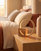 Essential Sunrise Simulation Alarm Clock on a bedroom nightstand at dawn