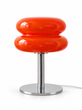 Orange red Italian glass table lamp on white background