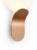 Brushed copper minimalist LED wall sconce on white background