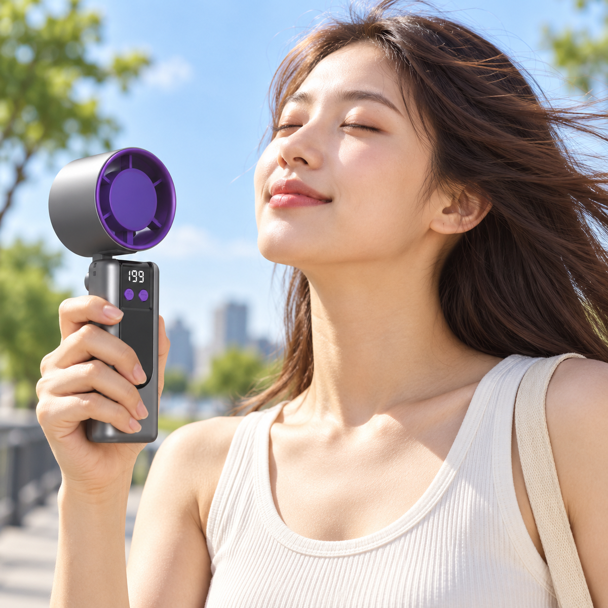 USB rechargeable handheld turbo fan in outdoor use