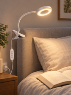 Flexible clamp lamp attached to a bedroom headboard