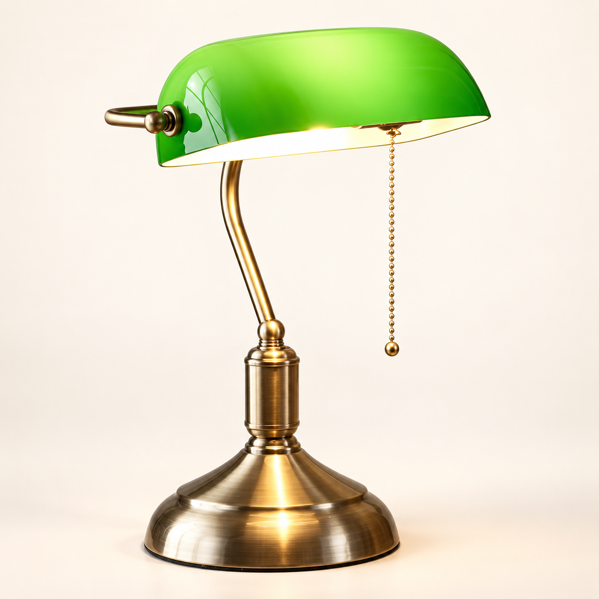 Classic banker desk lamp on warm white background