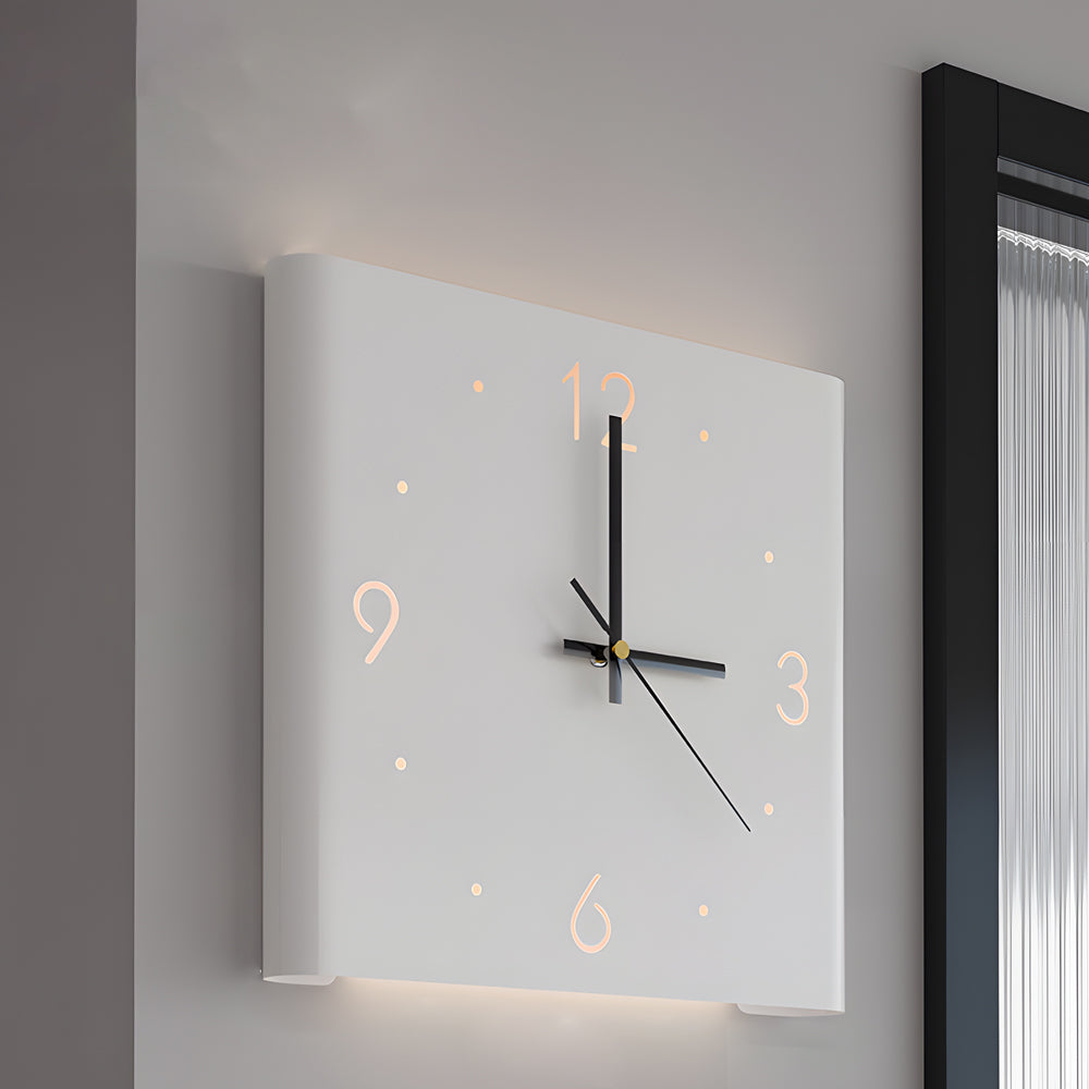Backlit LED Silent Wall Clock mounted in a modern living room