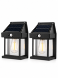 Set of two solar motion sensor wall lanterns on white background