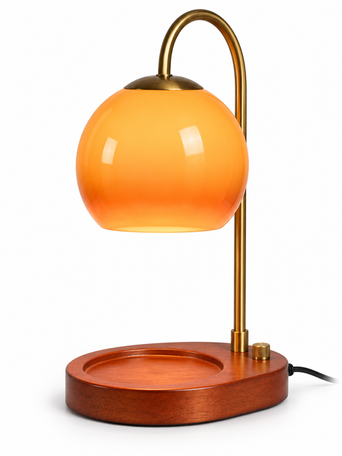 Orange glass candle warmer lamp on white background