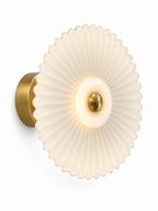 Pleated glass wall sconce on white background