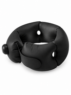 Black portable cervical U-shaped travel pillow on white