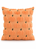 Peach orange pumpkin motif Halloween throw pillow on a seamless white background