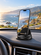 Black silicone phone holder on an SUV dashboard overlooking the coast